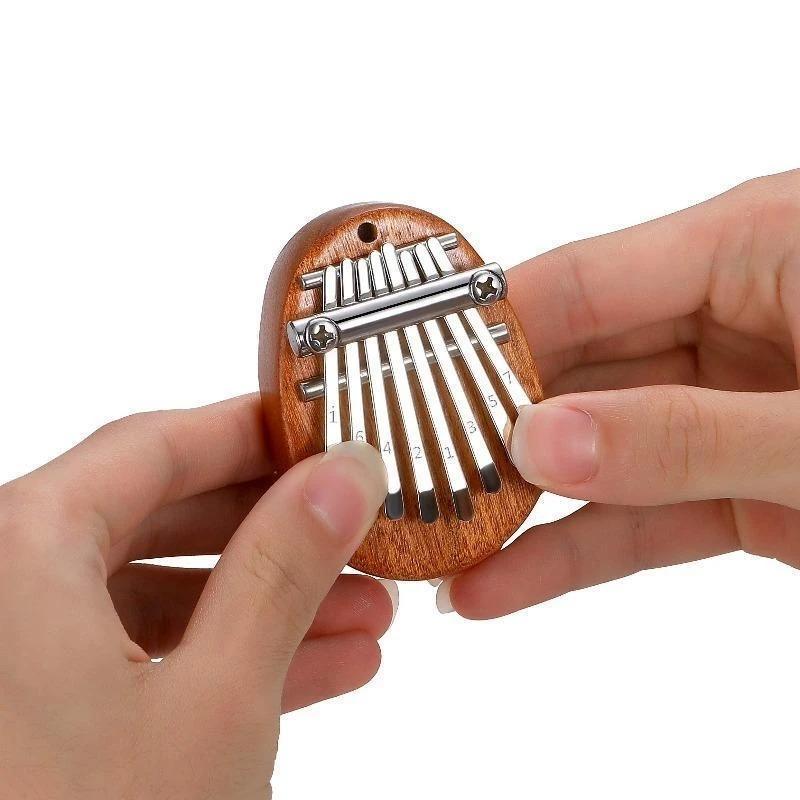 (LAST DAY 50% OFF) MINI THUMB PIANO